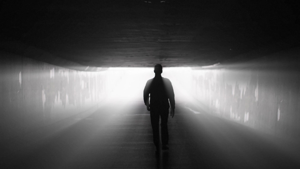 Silhouette of Man Walking in Tunnel To the Light, Stock Footage | VideoHive