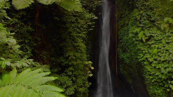 Aerial View of the Leke Leke Waterfall in Jungles of Bali, Indonesia alt