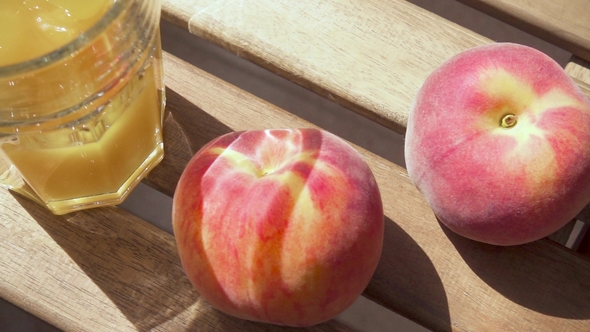 a Glass of Juice on a Wooden Table Top View