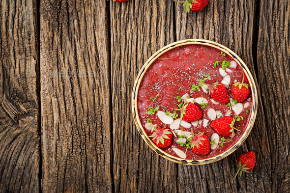 Vegan chia seeds pudding with strawberries and almond. Strawberries smoothie. - Stock Photo - Images