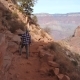 Sporty Man Hiking On A Footpath Trail In Grand Canyon National Park - VideoHive Item for Sale