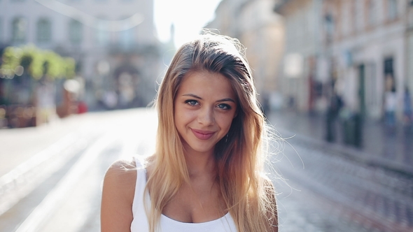 Portrait of Beautiful Young Woman with with Blue Eyes and Attractive ...