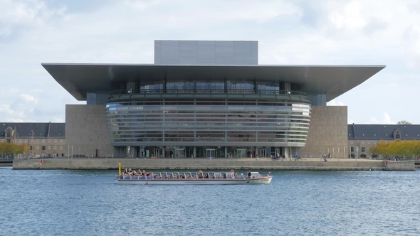 Touristic Boat Is Floating Near Copenhagen Opera House in Sunny Day