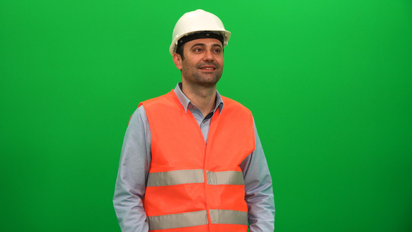 Architect or Engineer Worker Looking Around on Green Screen alt
