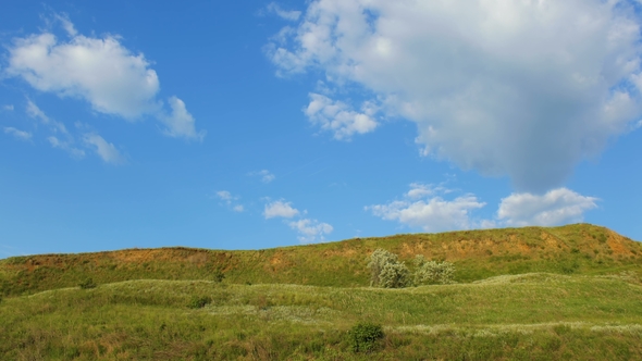 Clouds Move Outside the Hills Natural Landscape  Hills with Sunny Sky