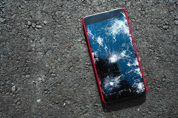 Smartphone with broken screen - Stock Photo - Images