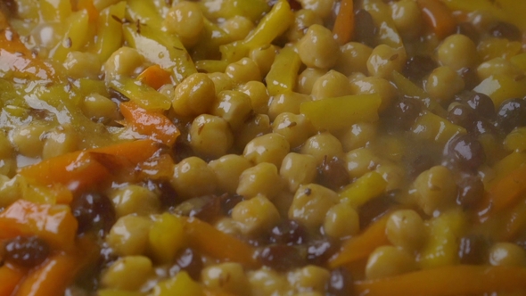 Stewed Vegetables in a Pan Cooking Vegetarian Dishes of Chickpeas.