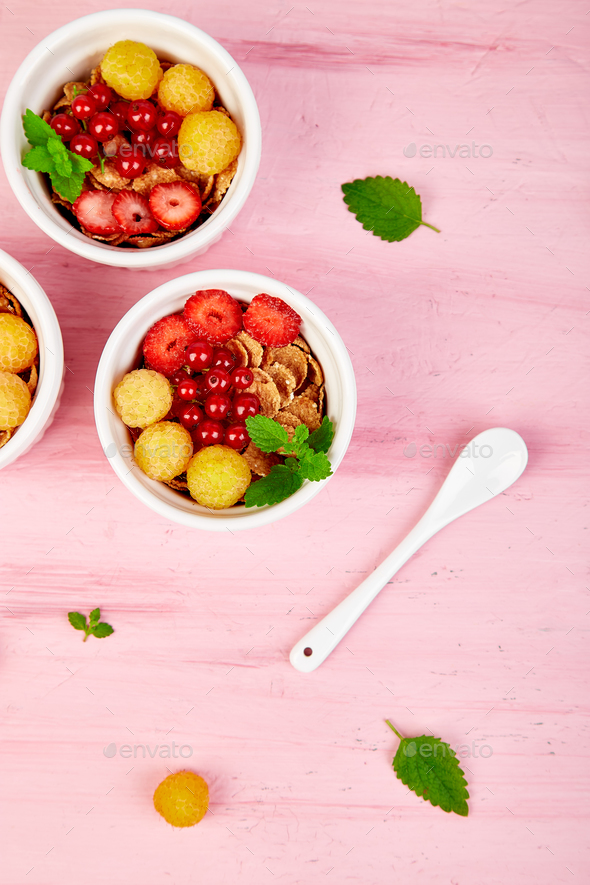 Healthy breakfast on white bowls. - Stock Photo - Images