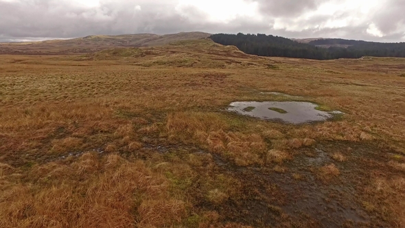 Aerial View Through the Moor and Mountains of Wales United Kingdom alt