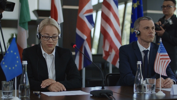 Symposium Members Applauding To Speech alt