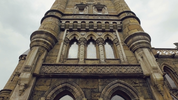 Facade of Tower of Building in Gothic-renaissance Style, Stained-glass Windows, Bas-reliefs