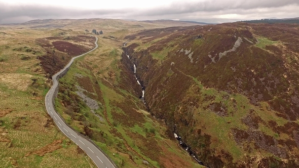 Aerial View of the B4391 Through the Moor and Mountains of Wales Close To Waterfall, United Kingdom alt