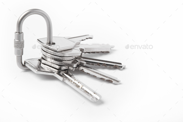 Key ring with keys over white background. Rent, buy home - Stock Photo - Images