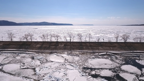 Flying a Drone Over a Frozen River,water and Ice on a Frozen River