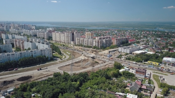 Camera Flying Over Dormitory of Big Modern Russian City, Near Construction of Modern Junction
