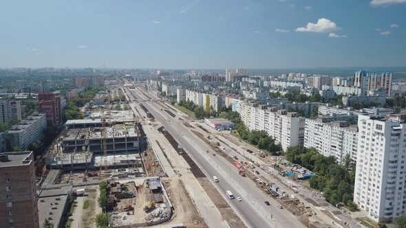 Aerial Panorama of Huge Modern City, Construction of Roads and Buildings, Summer Day, Sunny Weather