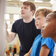 Teacher and kids looking at a science exhibit, close up - $5.00 Teacher and kids looking at a science exhibit, close up