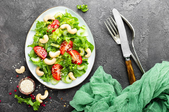 Salad with fresh vegetables and nuts - Stock Photo - Images