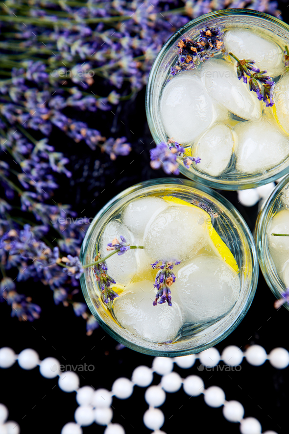 Lavender lemonade with lemon and ice - Stock Photo - Images