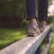 Children's Legs . the Child Is on the Crossbar and Balances in the Air. the Concept of a Happy and - VideoHive Item for Sale