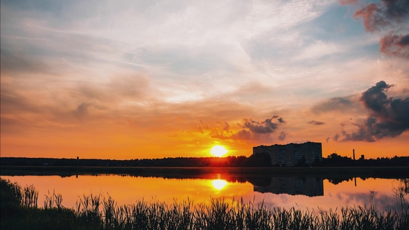 Sunset Behind the Lake on a Summer Evening alt