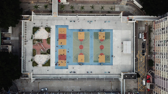 Drone flight over basketball court in Hong Kong