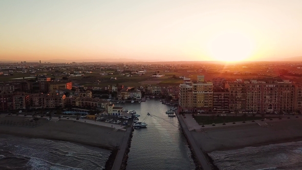 View From Above During Sunset on Mediterranean Sea Coast Near Valencia. Port Saplaya in Spain