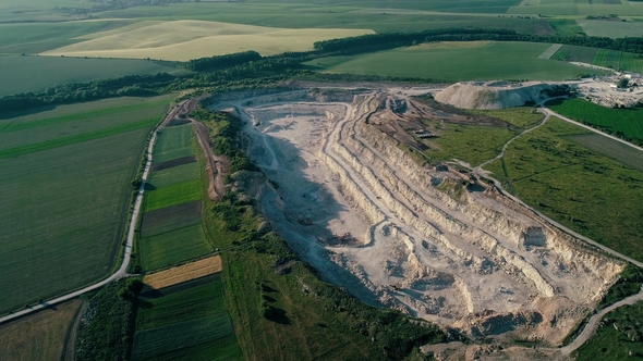 Drone Aerial Footage. Fly Around a Mountain Stone Quarry