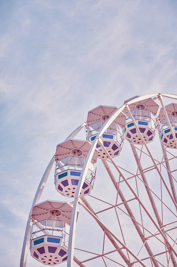 Retro toned picture of a Ferris wheel. - Stock Photo - Images