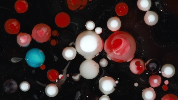 Abstract Background. Acrylic Red, White and Blue Bubbles Mixing in Oil on Black alt