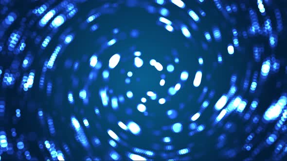 Illuminated spinning blue light in futuristic dark abstract background