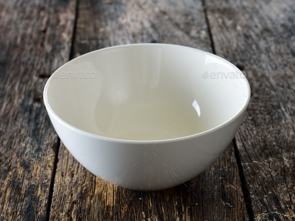 empty bowl on wood - Stock Photo - Images