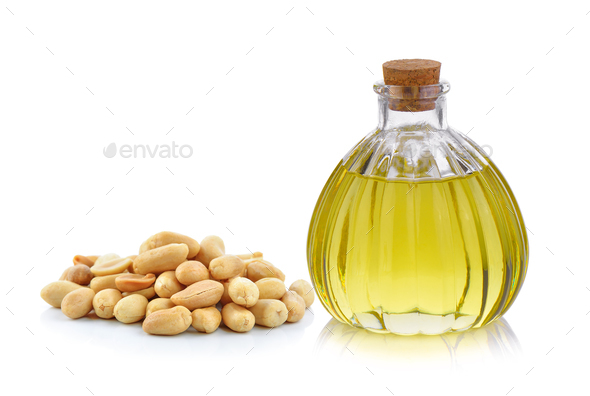 Oil bottle and peanuts on white background Stock Photo by sommai | PhotoDune