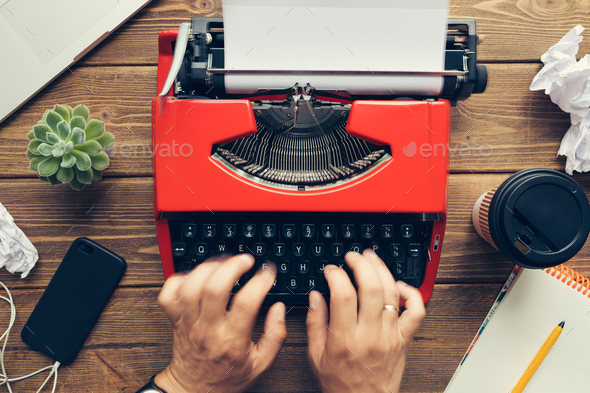 Top view of man using typewriter Stock Photo by KonstantinKolosov | PhotoDune