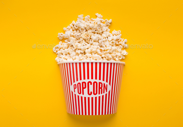 Download Bucket Of Popcorn On Yellow Background Stock Photo By Prostock Studio