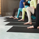 Young women and men in yoga class, relax meditation pose Stock Photo by  Prostock-studio