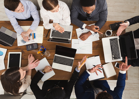 Business people meeting in office, top view Stock Photo by Prostock-studio