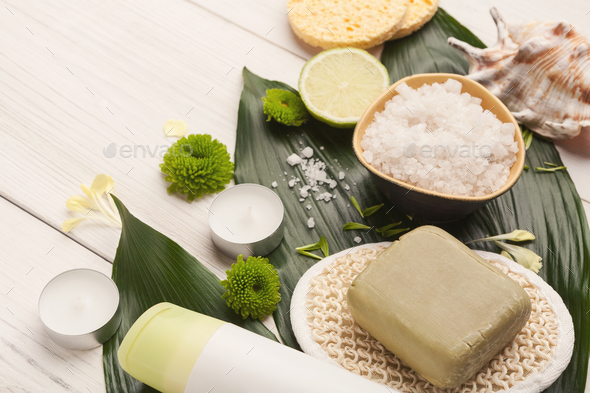 Spa background with facial mask and cream on white wood Stock Photo by Prostock-studio