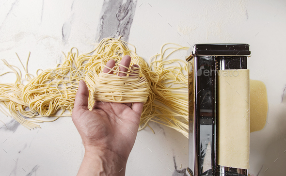 Homemade uncooked pasta Stock Photo by NatashaBreen | PhotoDune