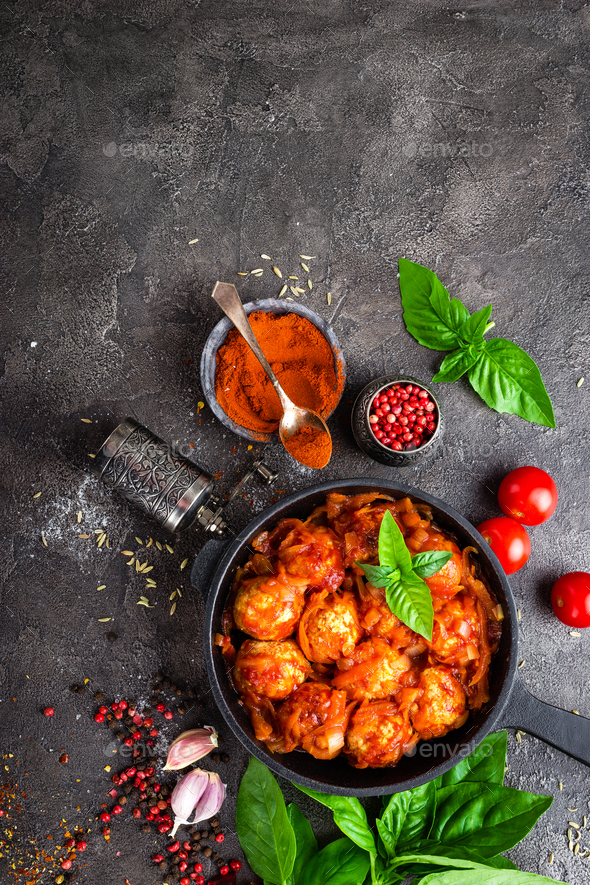 Meatballs. Meatballs in tomato sauce with carrot and onion Stock Photo