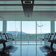Modern airport departure lounge with plane taking off - PhotoDune Item for Sale
