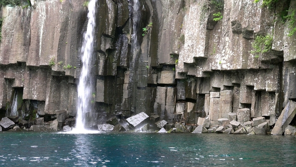Cheonjeyeon Waterfall on Jeju Island, South Korea alt