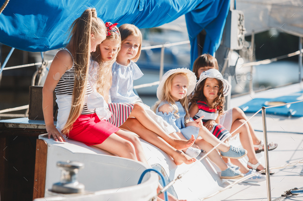 The children on board of sea yacht Stock Photo by master1305 | PhotoDune