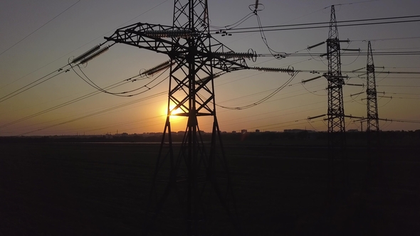 Sunset and High-voltage Power Pylon alt