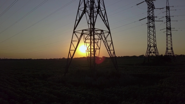 Sunset and High-voltage Power Pylon alt