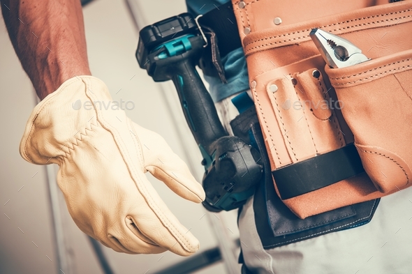 Contractor Work Time Stock Photo by duallogic | PhotoDune