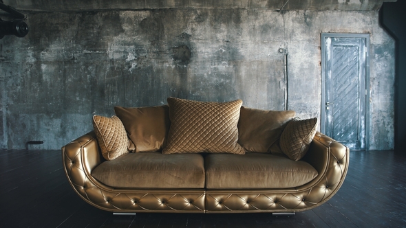 Luxurious Sofa in a Modern Interior In Dark Tones and Shades of Gold