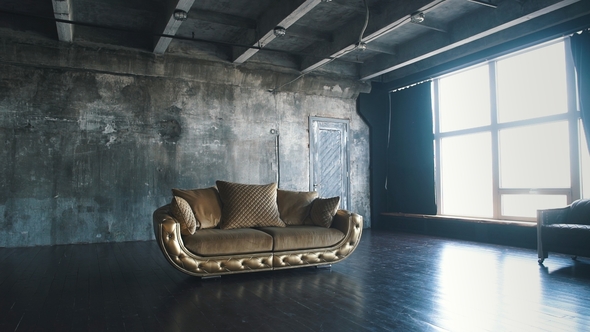Luxurious Sofa in a Modern Interior In Dark Tones and Shades of Gold