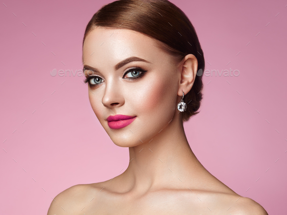 Beautiful woman face with perfect makeup Stock Photo by heckmannoleg