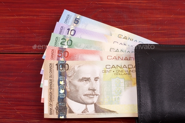 Canadian money in the black wallet Stock Photo by johan10 | PhotoDune